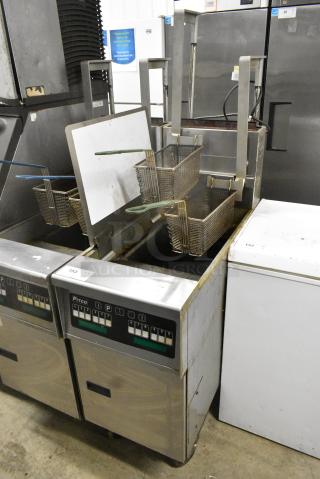 Pitco Frialator SG14R Stainless Steel Commercial Floor Style Natural Gas Powered Deep Fat Fryer w/ 2 Metal Fry Baskets on Commercial Casters. 122,000 BTU.