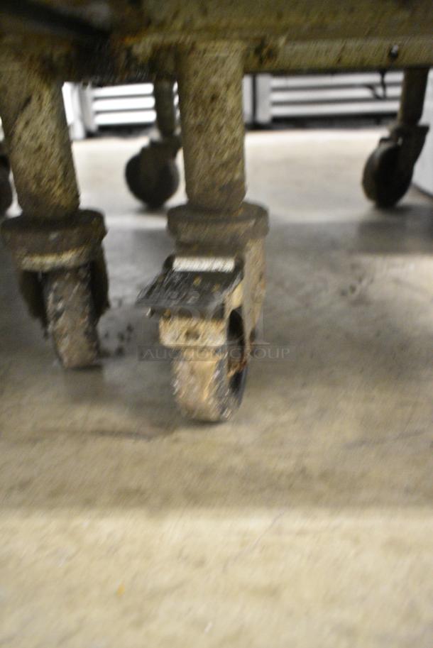 Pitco Frialator SG14R Stainless Steel Commercial Floor Style Natural Gas Powered Deep Fat Fryer w/ 2 Metal Fry Baskets on Commercial Casters. 122,000 BTU. - Image 3 of 8