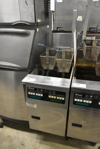 Pitco Frialator SG14R Stainless Steel Commercial Floor Style Natural Gas Powered Deep Fat Fryer w/ 2 Metal Fry Baskets on Commercial Casters. 122,000 BTU.