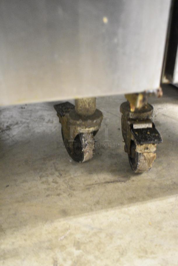 Pitco Frialator SG14R Stainless Steel Commercial Floor Style Natural Gas Powered Deep Fat Fryer w/ 2 Metal Fry Baskets on Commercial Casters. 122,000 BTU. - Image 3 of 8