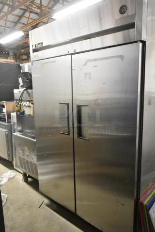 True TG2R-2S Stainless Steel Commercial 2 Door Reach In Cooler w/ Poly Coated Racks on Commercial Casters. 115 Volts, 1 Phase. Tested and Working!