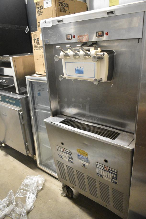 Taylor 339-33 Stainless Steel Commercial Floor Style Water Cooled 2 Flavor w/ Twist Soft Serve Ice Cream Machine on Commercial Casters. 208-230 Volts, 3 Phase. - Image 1 of 9
