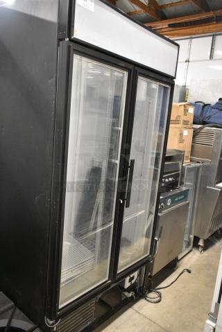 True GDM-35F-LD Metal Commercial 2 Door Reach In Freezer Merchandiser w/ Poly Coated Racks. 115 Volts, 1 Phase. Tested and Powers On But Does Not Get Cold