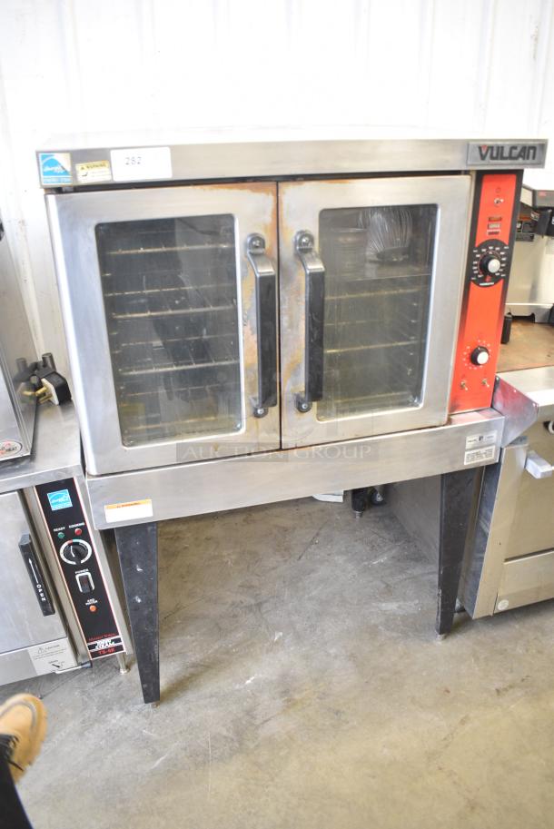 Vulcan Stainless Steel Commercial Natural Gas Powered Full Size Convection Oven w/ View Through Doors, Metal Oven Racks and Thermostatic Controls on Metal Legs. - Image 1 of 5