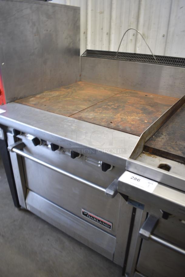 Garland M46R Stainless Steel Commercial Natural Gas Powered Flat Top Griddle w/ Oven and Back Splash. - Image 2 of 6