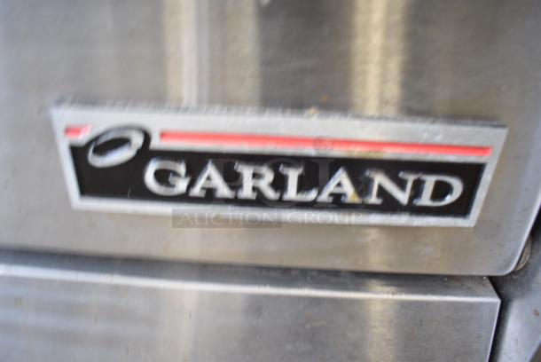 Garland M46R Stainless Steel Commercial Natural Gas Powered Flat Top Griddle w/ Oven and Back Splash. - Image 5 of 6