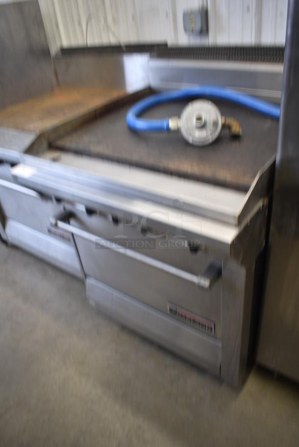 Garland M47R Stainless Steel Commercial Natural Gas Powered Flat Top Griddle w/ Oven and Back Splash. - Image 2 of 7
