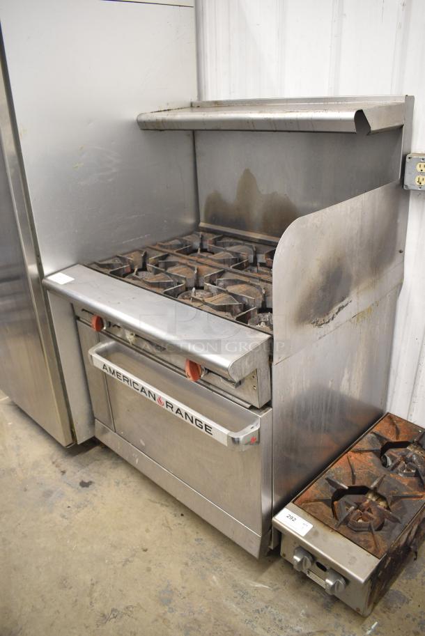 American Range Stainless Steel Commercial Natural Gas Powered 6 Burner Range w/ Oven, Over Shelf, Back Splash and Right Side Splash Guard. - Image 1 of 7