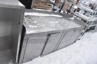 Stainless Steel Counter w/ 4 Doors.