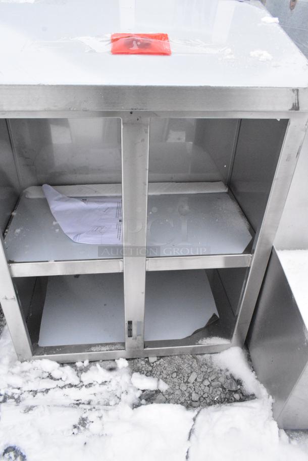 BRAND NEW SCRATCH AND DENT! Regency 600WCH1524 15" Wide Stainless Steel Wall Cabinet with Hinged Doors. Doors Need To Be Reattached. - Image 3 of 4