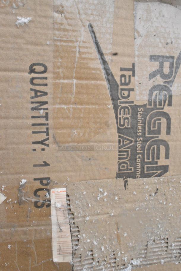BRAND NEW SCRATCH AND DENT! Regency 600TSB3048S 30" x 48" 16-Gauge Stainless Steel Commercial Work Table with 4" Backsplash and Undershelf. May Be Missing Pieces. - Image 4 of 8