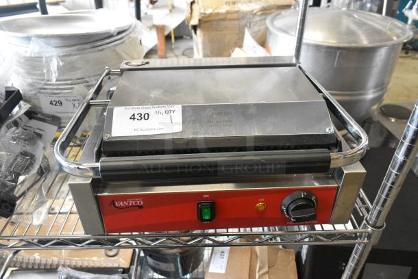 BRAND NEW SCRATCH AND DENT! 2024 Avantco PG200GS Commercial Panini Sandwich Grill with Grooved Top and Smooth Bottom Plates, and 13 3/8" x 8 3/4" Cooking Surface. 120 Volts, 1 Phase. Tested and Working! - Image 3 of 10