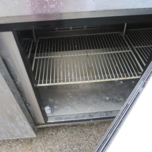 One Turbo Air 3 Door Refrigerated Prep Table With 3 Racks On Casters. Model# MST-72. 115 Volt. 72X30X43. $4576.87 - Image 2 of 2