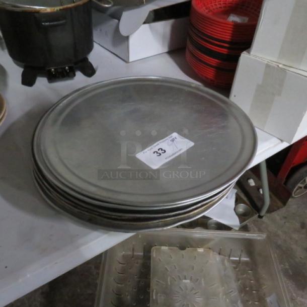 One Lot Of 9-16 Inch Pizza Pans. - Image 1 of 1
