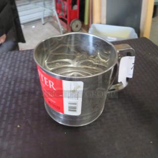 One Stainless Steel Sifter.