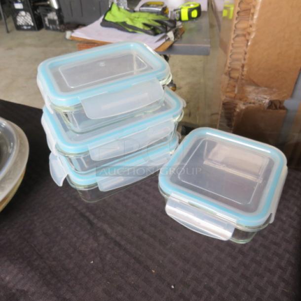 One Lot Of 4 Food Storage Glass Containers With Lids. - Image 1 of 1