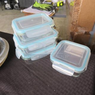 One Lot Of 4 Food Storage Glass Containers With Lids.