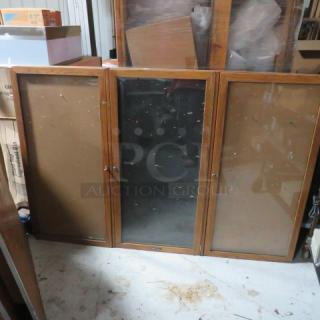 One Wooden Framed 3 Door Enclosure/Bulletin Board With Key. 72X48