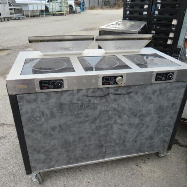 One Spring Mobile Induction Cooking Cart With 3 -2600 Watt Ranges, 2 AF-350 Air Filter Systems, And Power Management System On Casters. 208-240 Volt. 1 Phase. 8500 Watt.  48X24X42. $18,774.01. - Image 1 of 4