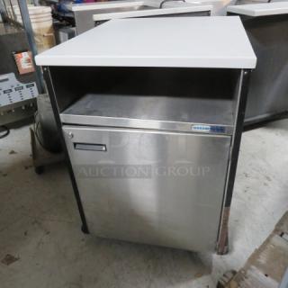 One Mobile Counter/Kiosk With White Marble Look Countertops, And 1 Door Wassertrom SS Under Storage On Casters. 28X32X39