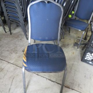 Black Metal Stack Chair With Blue Cushioned Seat And Back. Half Have Some Flaws. See Pics. 10XBID