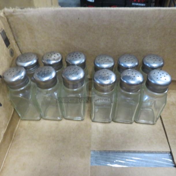 One Lot Of 12 Salt/Pepper Shakers. - Image 1 of 1