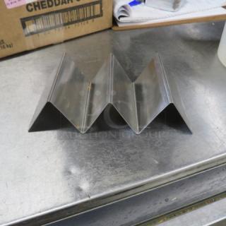 One Lot Of 16 Stainless Steel Taco Holders.
