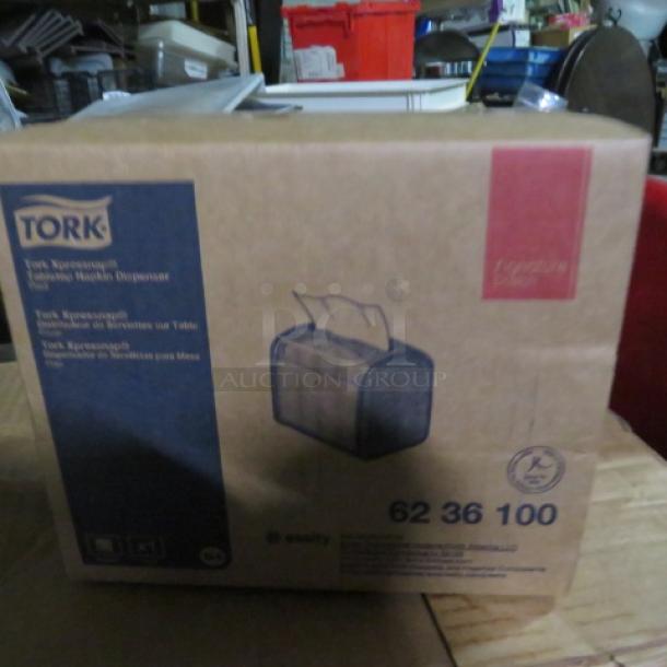 NEW Tork Napkin Dispenser. #6236100. 4XBID - Image 1 of 1