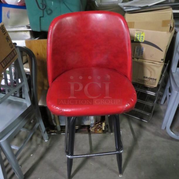 One Red Cushioned Bar Height Chair With Footrest And A Swivel Seat. - Image 1 of 1