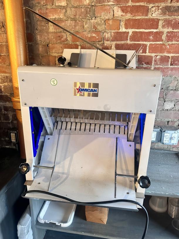 New Omcan Countertop Bread Slicer - 1" Slice Thickness, 18 3/4" Max Loaf Length - 110V, 1/4 hp Tested and Working! - Image 1 of 11