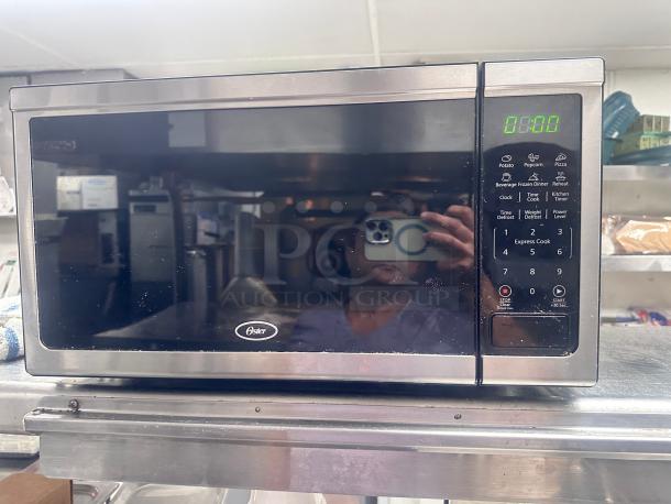 Oster OGCMDM11S2-10 Microwave Oven 115volt Tested and Working! - Image 1 of 6