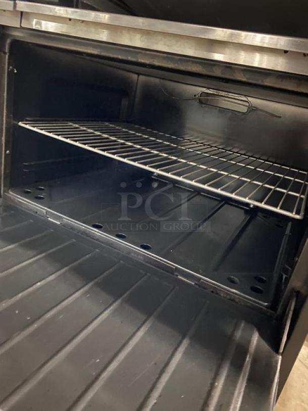 WOW! Garland Commercial Stainless Steel Natural Gas Powered 6 Burner/Raised Flat Griddle Split Top Range & Double Oven Combo! With Built-In Broiler/Cheese Melter! With Back Splash & Overhead Salamander Shelf! With Wired Oven Racks! On Casters! Working When Removed! - Image 9 of 10