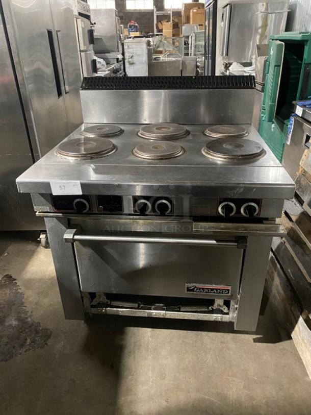 Garland Commercial Stainless Steel Electric Powered 6 Sealed Burner Range/Oven Combo! With Back Splash! With Wire Oven Rack! On Casters! - Image 1 of 8