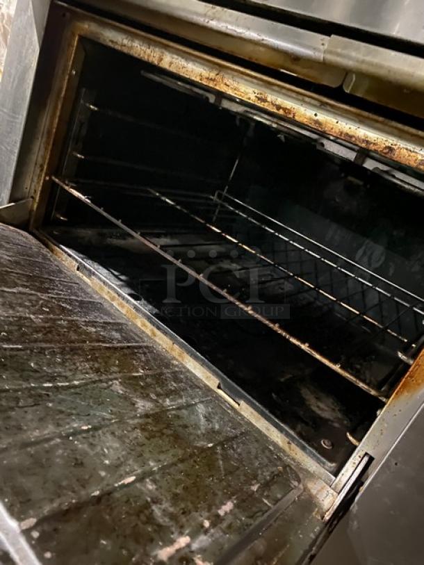 Garland Commercial Stainless Steel Electric Powered 6 Sealed Burner Range/Oven Combo! With Back Splash! With Wire Oven Rack! On Casters! - Image 7 of 8