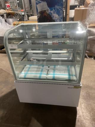 NEW! Scratch-N-Dent! Marchia Commercial White 36" Curved Glass Refrigerated Bakery Display Showcase! With Adjustable Glass Shelves! With LED Lighting! With Rear Sliding Glass Doors! Model: MB36-W SN: C-2400080320007! 110-120V! On Casters!