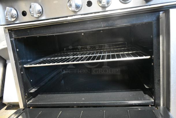 Imperial Stainless Steel Commercial Propane Gas Powered 6 Burner Range w/ Oven and Back Splash. - Image 6 of 7