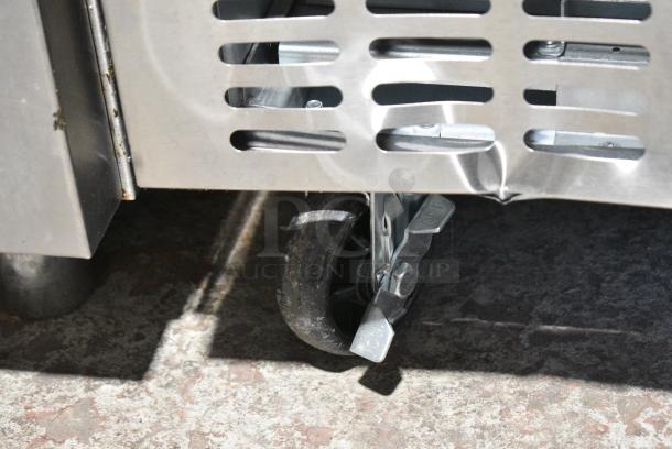 BRAND NEW SCRATCH AND DENT! 2024 Avantco 178SSUD1R Stainless Steel Commercial Single Door Undercounter Cooler on Commercial Casters. 115 Volts, 1 Phase. Tested and Working! - Image 4 of 7