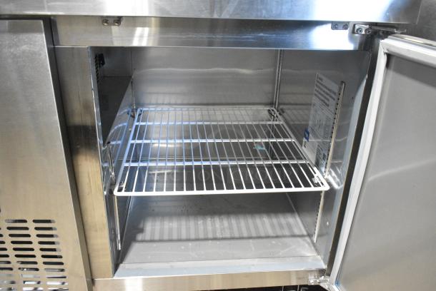 BRAND NEW SCRATCH AND DENT! 2024 Avantco 178SSUD1R Stainless Steel Commercial Single Door Undercounter Cooler on Commercial Casters. 115 Volts, 1 Phase. Tested and Working! - Image 5 of 7