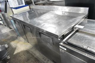 True TWT-72 Stainless Steel Commercial 3 Door Work Top Cooler on Commercial Casters. 115 Volts, 1 Phase. Tested and Powers On But Does Not Get Cold