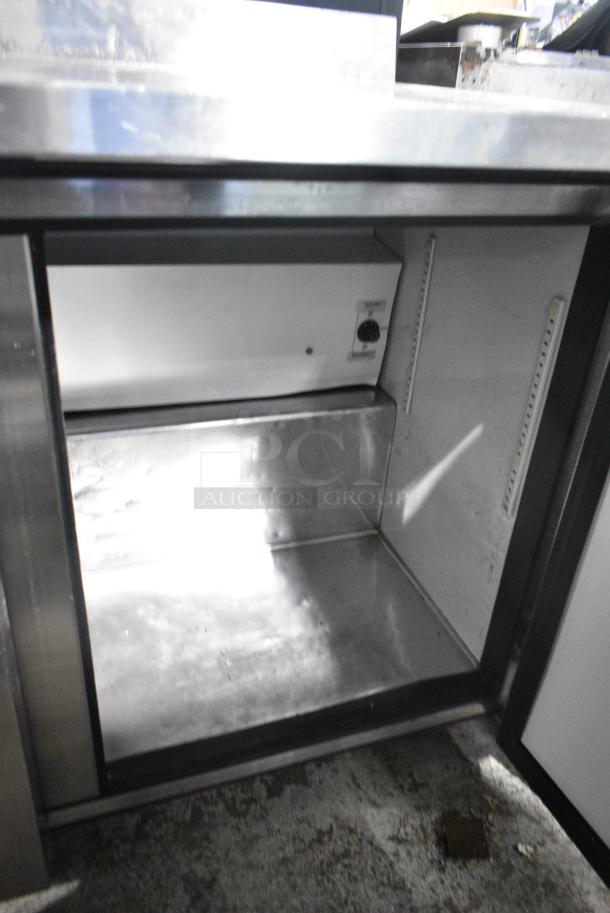 True TWT-72 Stainless Steel Commercial 3 Door Work Top Cooler on Commercial Casters. 115 Volts, 1 Phase. Tested and Powers On But Does Not Get Cold - Image 7 of 8