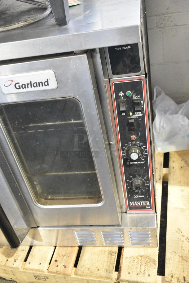 Garland Master 200 Stainless Steel Commercial Natural Gas Powered Full Size Convection Oven w/ View Through Doors, Metal Oven Racks and Thermostatic Controls. - Image 4 of 8