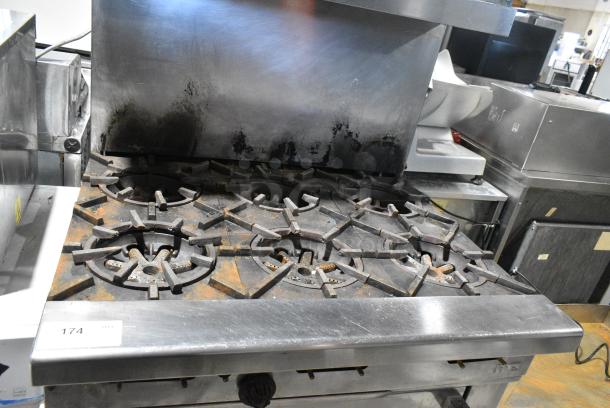 Stainless Steel Commercial Natural Gas Powered 6 Burner Range w/ Oven, Over Shelf and Back Splash. - Image 3 of 5