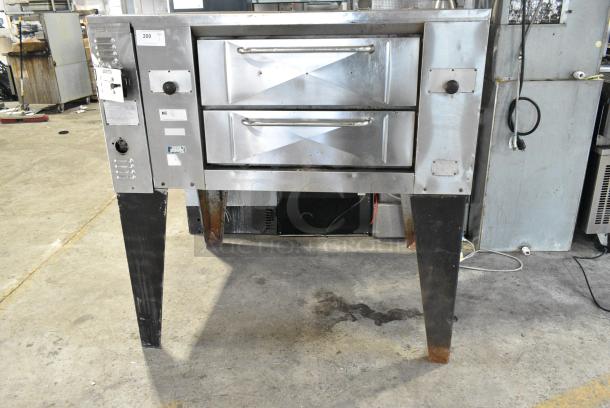 Bakers Pride GS805 Stainless Steel Commercial Natural Gas Powered Single Deck Pizza Oven on Metal Legs. 60,000 BTU. - Image 1 of 6