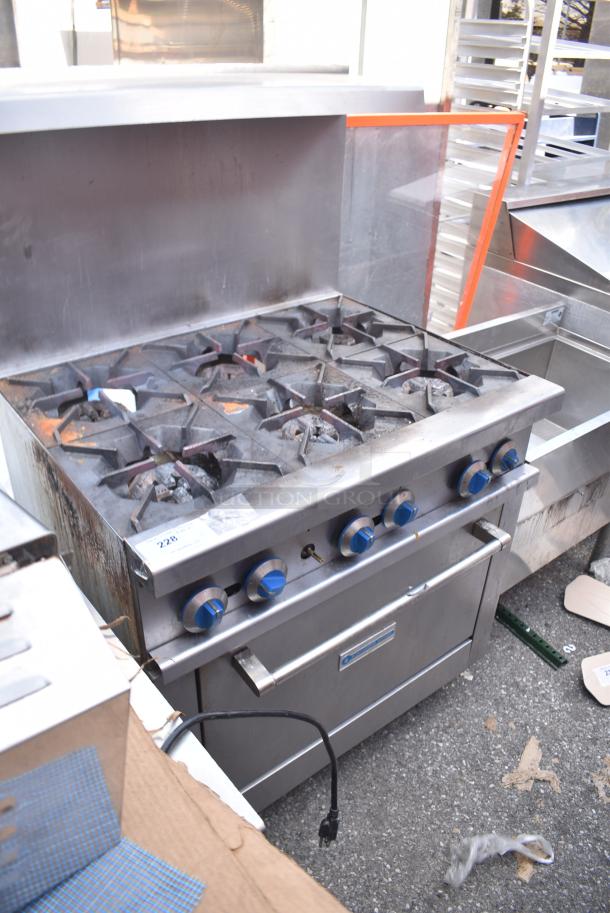 Standard Range Stainless Steel Commercial Gas Powered 6 Burner Range w/ Oven, Over Shelf and Back Splash. - Image 2 of 7