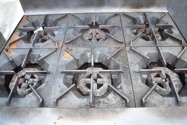 Standard Range Stainless Steel Commercial Gas Powered 6 Burner Range w/ Oven, Over Shelf and Back Splash. - Image 3 of 7
