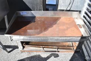 Stainless Steel Gas Powered Flat Top Griddle w/ Lower Cheese Melter.