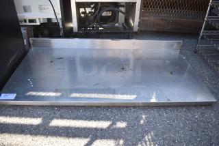 Stainless Steel Tabletop w/ Back Splash.