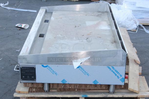 BRAND NEW!! Wolf by Vulcan AGM60-NAT Natural Gas 60" Heavy-Duty Gas Countertop Griddle with Manual Controls - 135,000 BTU. Minor Denting. S/N: 650245825 - Image 4 of 6