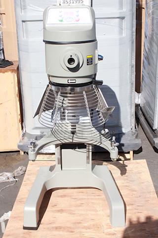BRAND NEW SCRATCH & DENT! Globe SP40 40 Qt. Planetary Floor Mixer with Guard & Standard Accessories - 208V, 3 Phase, 2 hp. S/N: 7451968. Scratched on the right side. The hand wheel and side lever are damaged. Includes broken pieces and rubber feet.