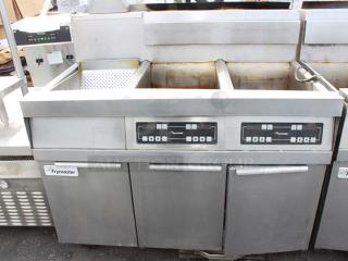 Frymaster SCFHD250GNCS/MC 100 lb. 2 Unit Natural Gas Floor Fryer System with CM3.5 Controls, 15MC 15 1/2" Stainless Steel Spreader Cabinet and Filtration System - 200,000 BTU. 110-120v. S/N: 1505TR0006